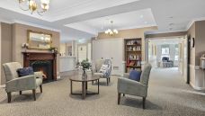 Bupa Coburg Aged Care with lounge and fireplace